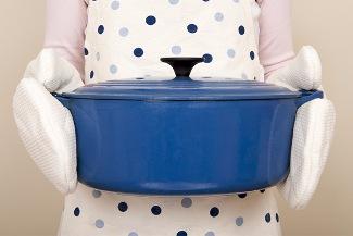 homemaker holding a pot